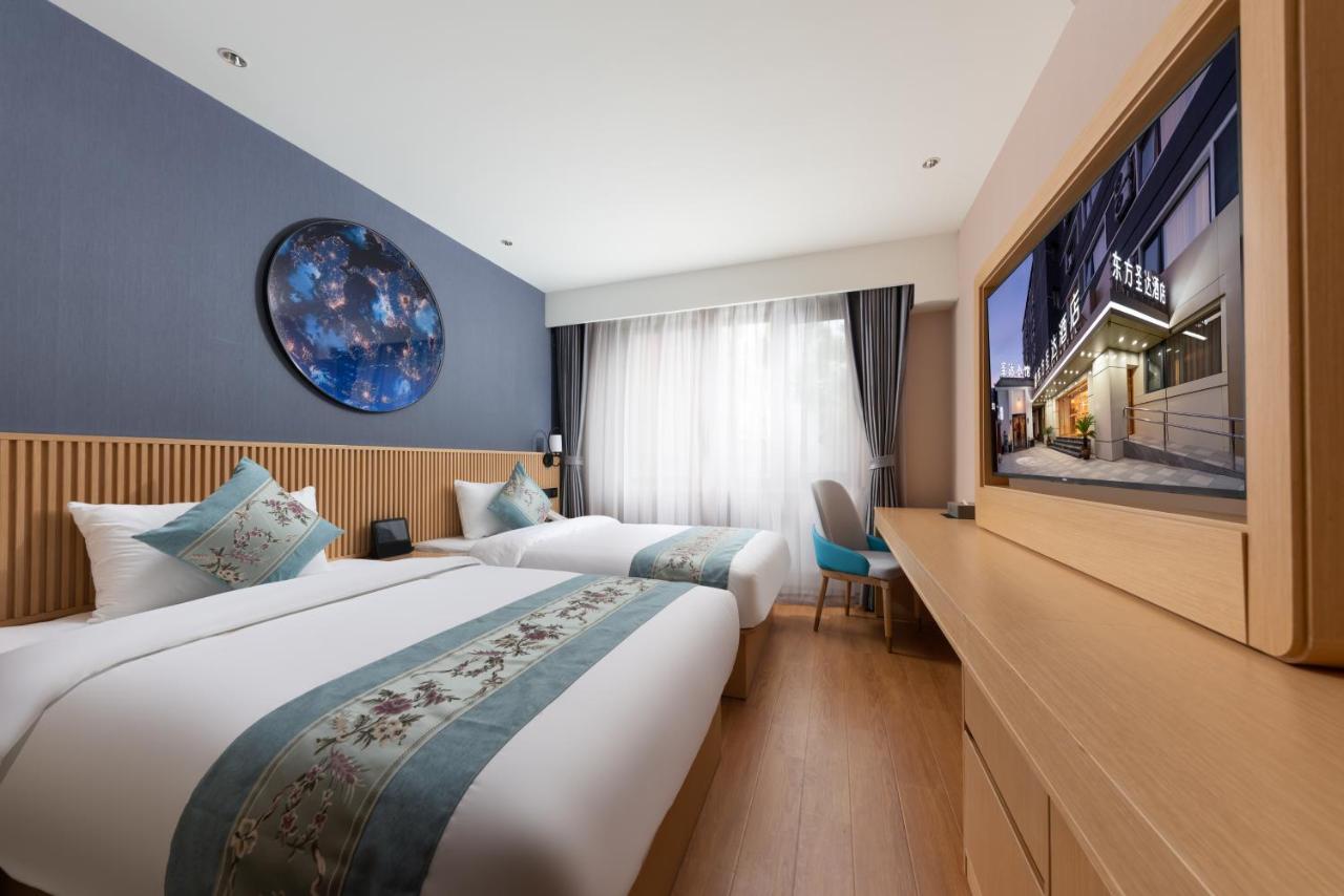 East Sacred Hotel: Tiananmen Square Proximity With Tourism Services Beijing