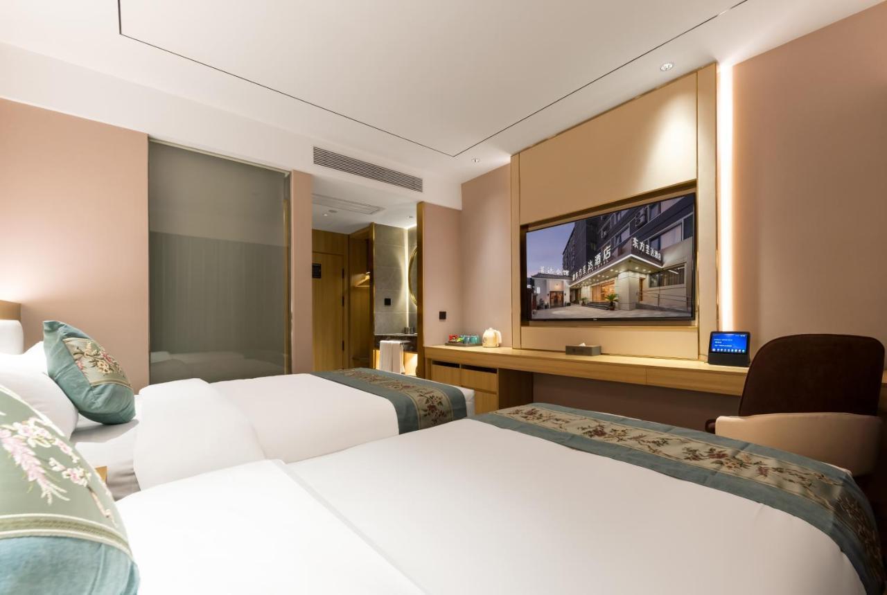 East Sacred Hotel: Tiananmen Square Proximity With Tourism Services